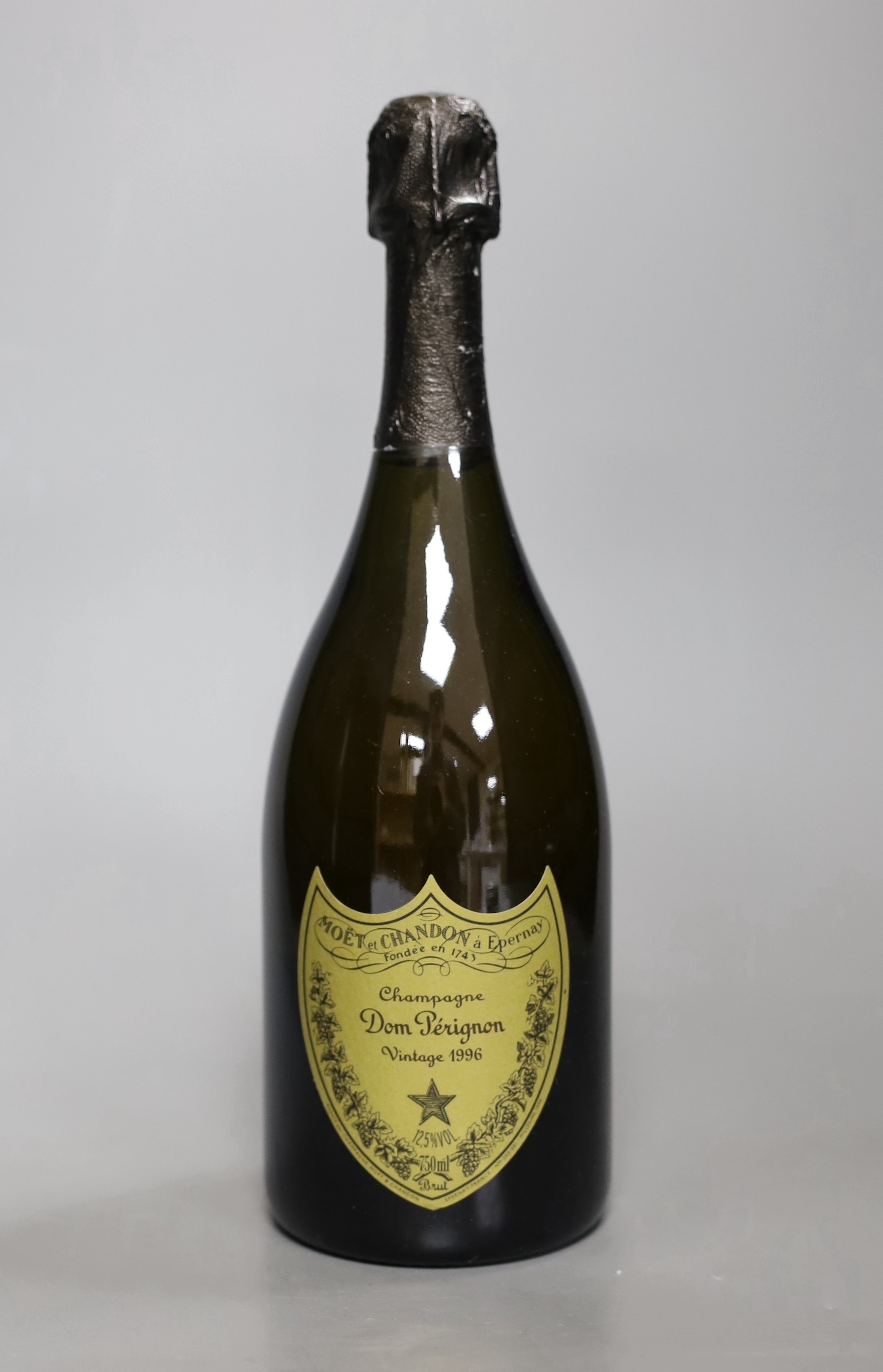 A cased bottle of Dom Perignon 1996 vintage Champagne.